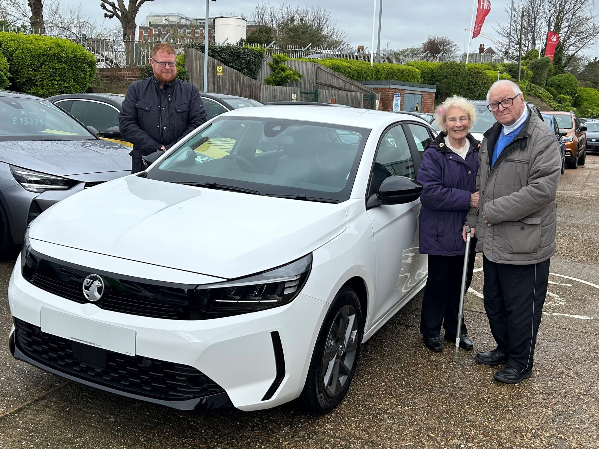 Bryan and Margaret Constable picking up their New Vauxhall Corsa from Phil Mulvey