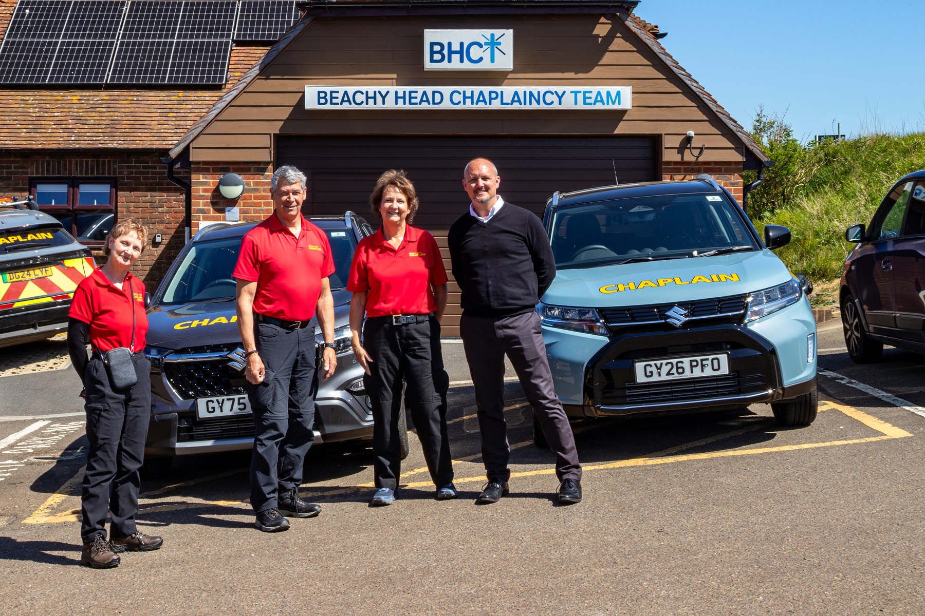 Gerry, Chief Executive Officer of BHCT, alongside members of the BHCT team, with Dan (EMC) at Beachy Head, Eastbourne.